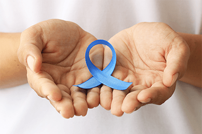 Hand With Blue Awareness Ribbon